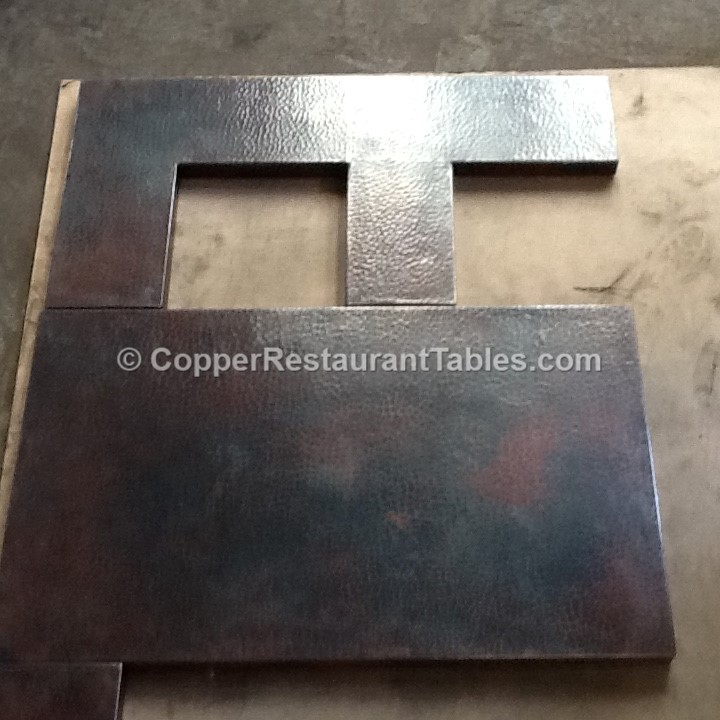 Copper bar top built to go around existing structural feature